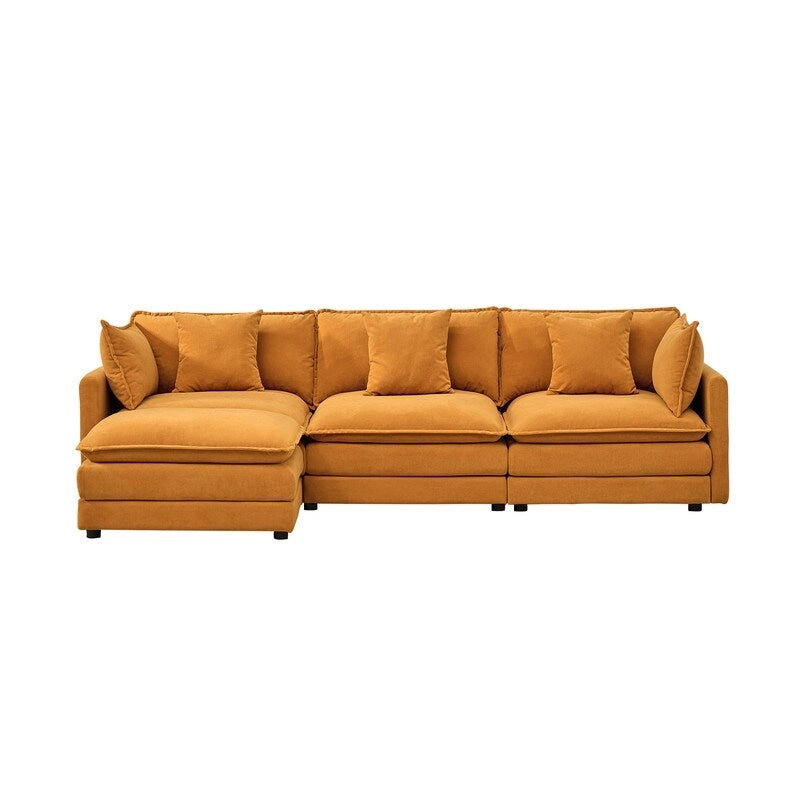 110.2 Canapé trois places capitonné en chenille, pouf