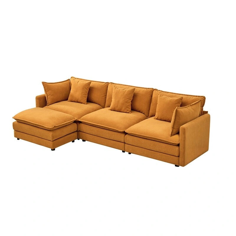 110.2 Canapé trois places capitonné en chenille, pouf