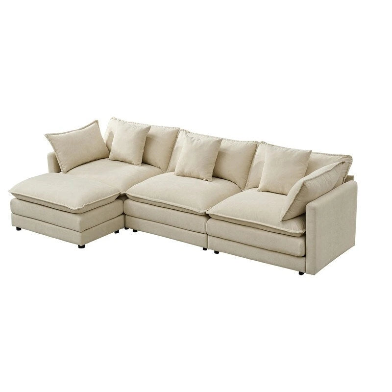 110.2 Canapé trois places capitonné en chenille, pouf